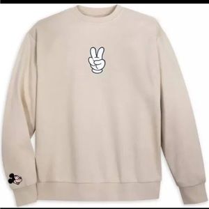 NEW With TAG!

Disney Mickey PEACE sign crew neck sweatshirt.     SMALL